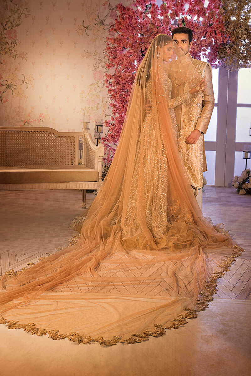 Gold Pakistani Bridal Dress in Gown and Lehenga Veil Dupatta Style UY Collection Gold Pakistani Bridal Dress in Gown and Lehenga Veil Dupatta Style UY Collection