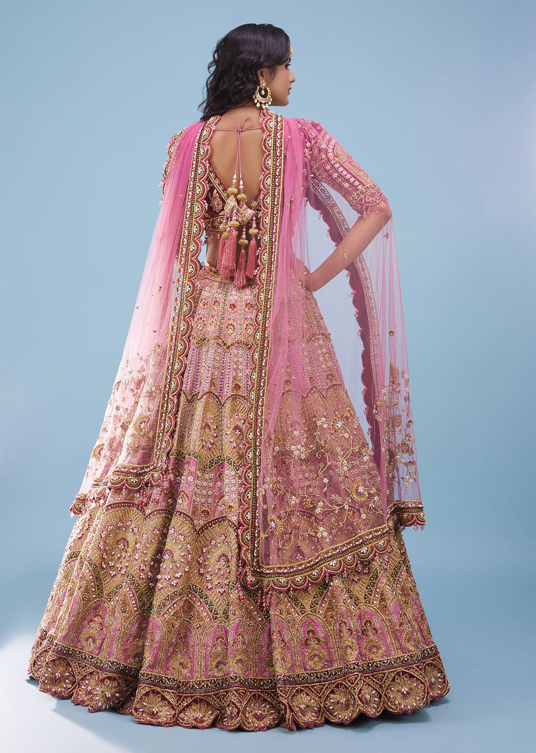 Rose Pink Junoesque Bridal Lehenga In Raw Silk With Heavy Embroidery