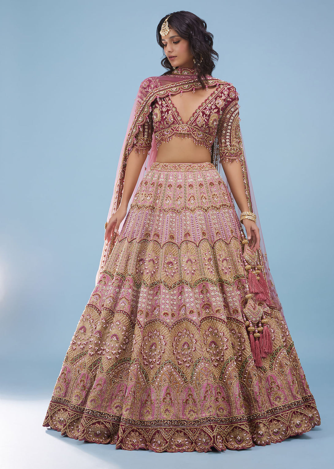 Rose Pink Junoesque Bridal Lehenga In Raw Silk With Heavy Embroidery