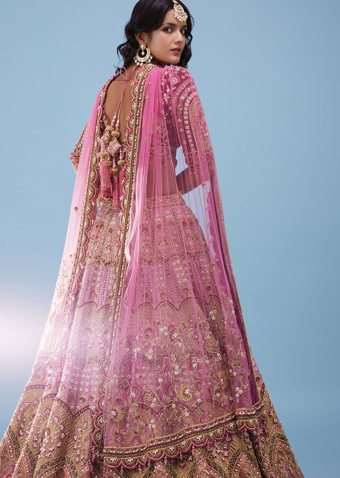 Rose Pink Junoesque Bridal Lehenga In Raw Silk With Heavy Embroidery